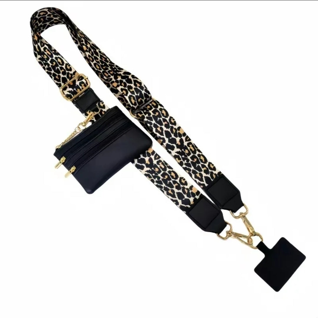 Leopard print strap with black phone pouch.