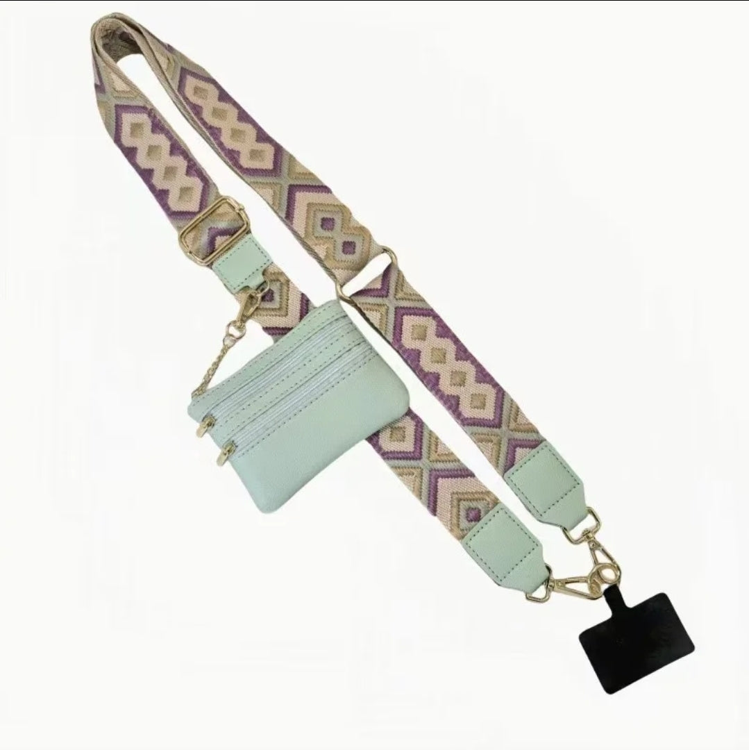 Purple patterned strap with small wallet and phone holder.