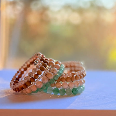 Beaded bracelets by window - 6BB5F5CB-4B7C-49EA-B15B
