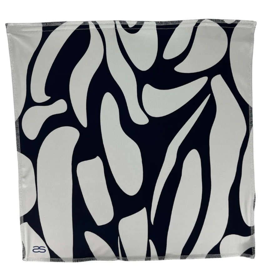 Abstract black and white pattern scarf, seen on June 12, 2025 screenshot.