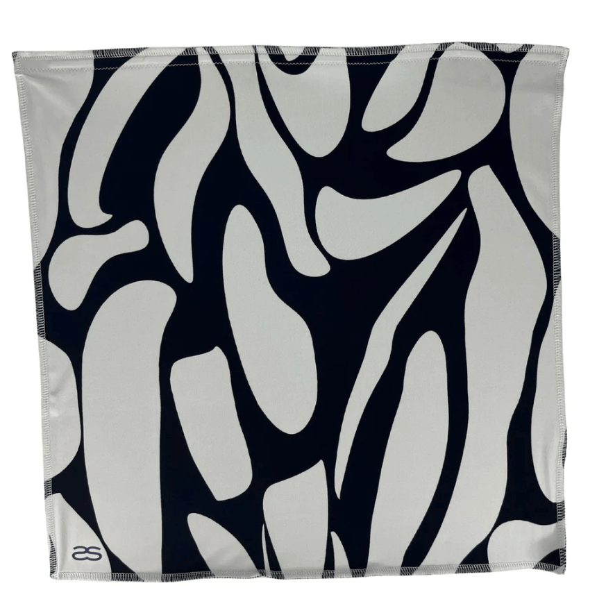 Abstract black and white pattern scarf, seen on June 12, 2025 screenshot.