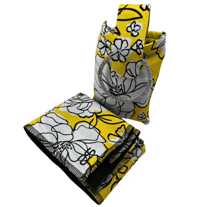 Yellow floral fabric and hoop earrings, screenshot June 12, 2025