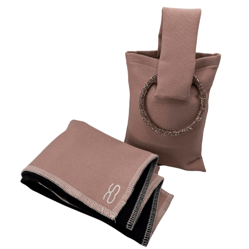 Pink handbag and folded cloth, screenshot June 12, 2025