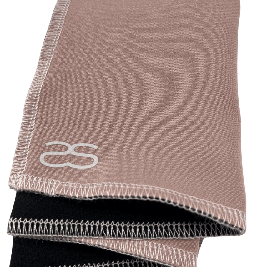 Screenshot of stacked pink & black fabric with as logo.