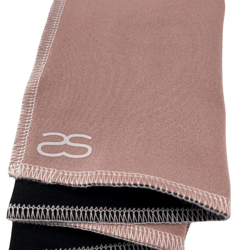 Screenshot of stacked pink & black fabric with as logo.