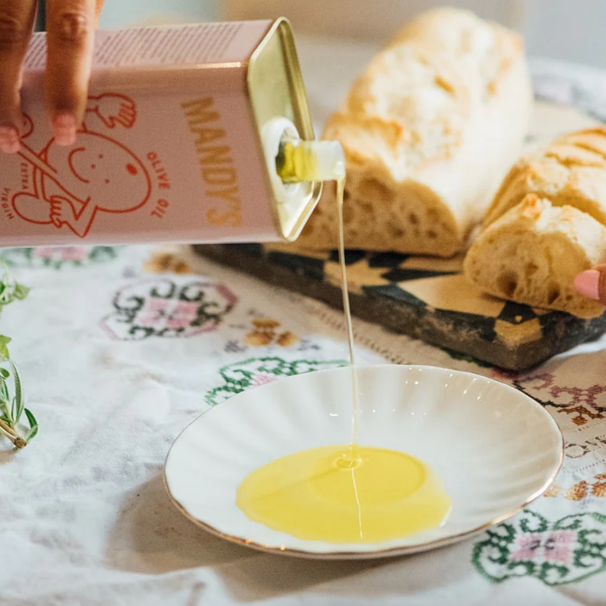Mandy's Olive Oil pouring into a plate, screenshot from July 9, 2025