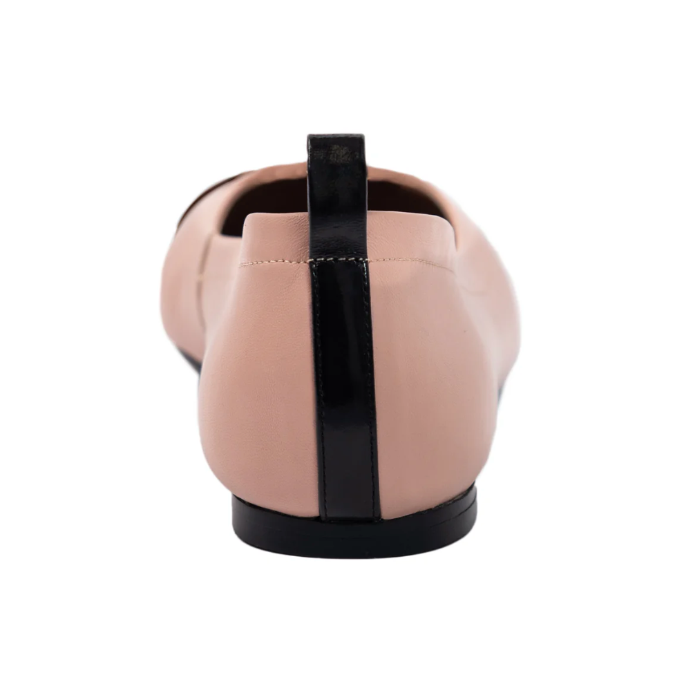 Pink and black ballet flat shoe