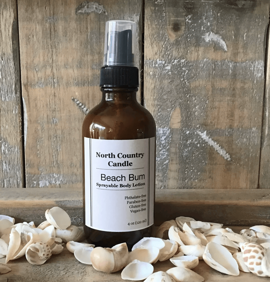 North Country Candle Beach Bum body lotion bottle with seashells