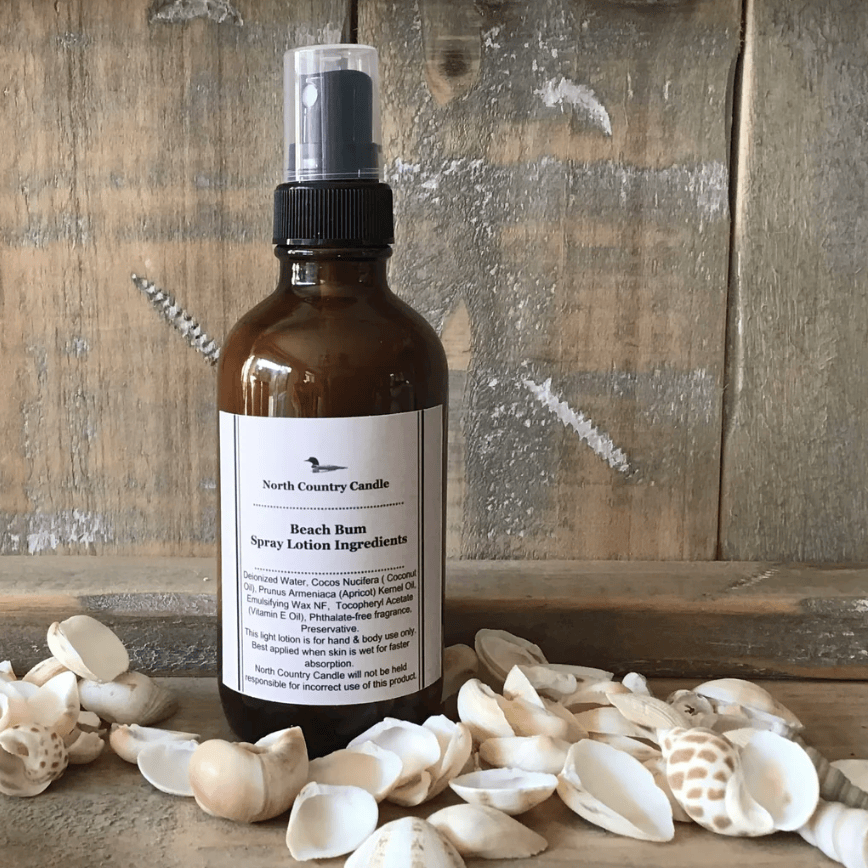 Beach Bum Spray Lotion bottle with seashells.