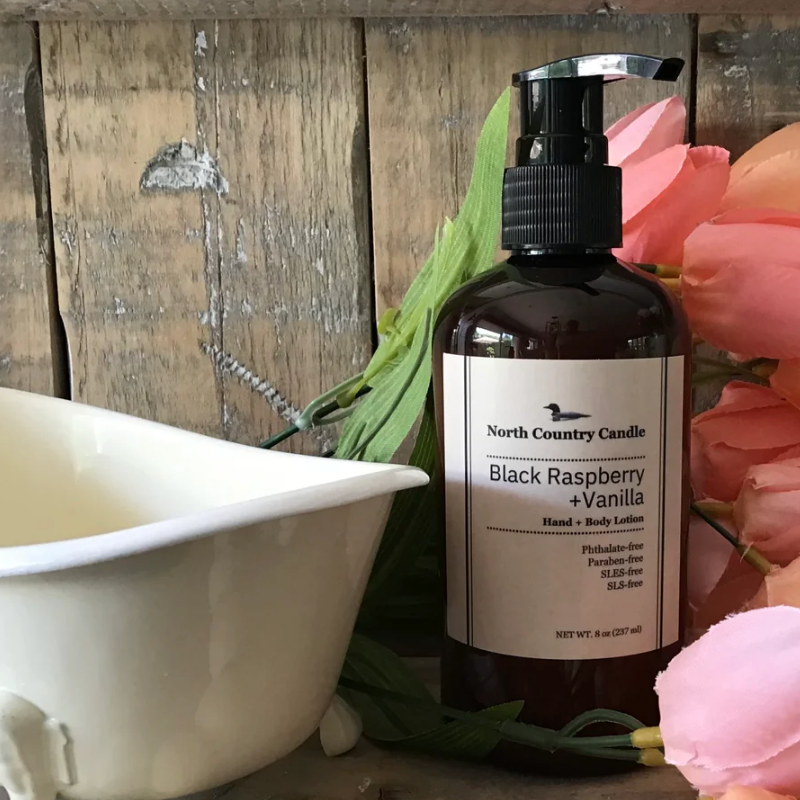 Screenshot of Black Raspberry + Vanilla lotion bottle next to tub