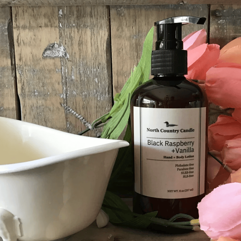 Screenshot of Black Raspberry + Vanilla lotion bottle next to tub