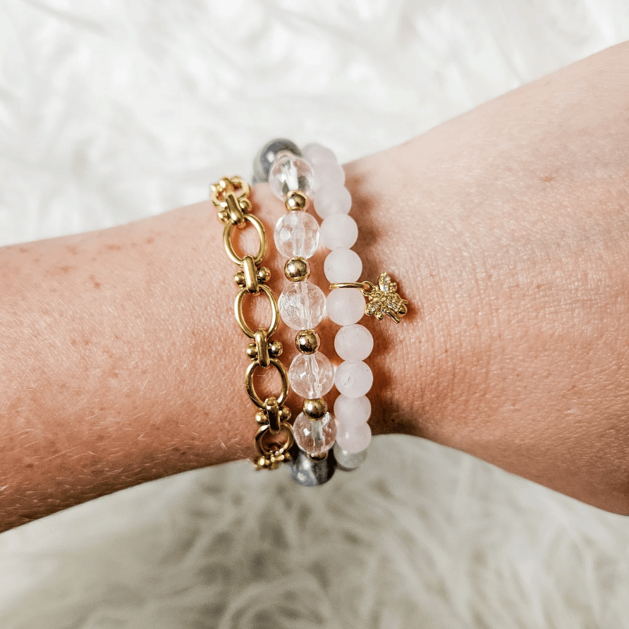 Bracelet stack on wrist, screenshot from July 21, 2025.