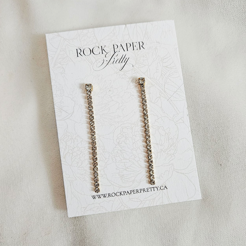 Rock Paper Pretty earrings on card, screenshot July 21, 2025