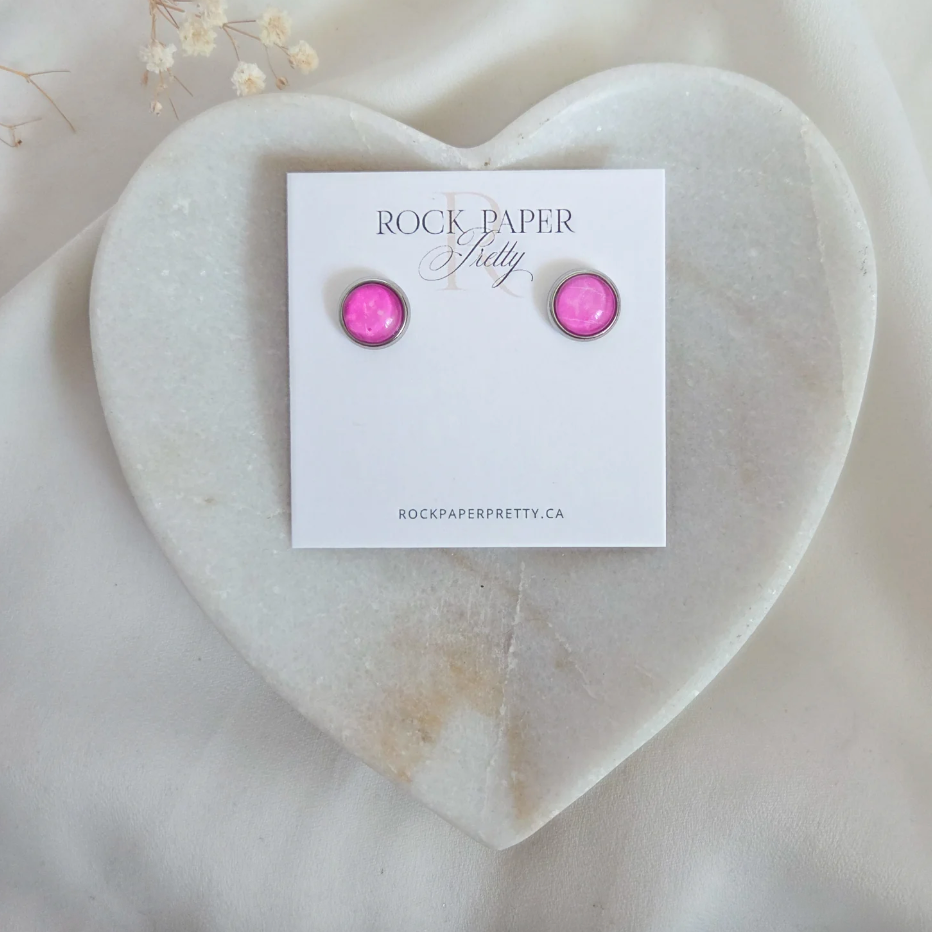 Pink stud earrings on display, July 21, 2025 screenshot.