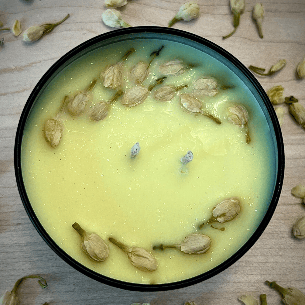 Jasmine scented candle with dried flowers, screenshot from July 22, 2025.