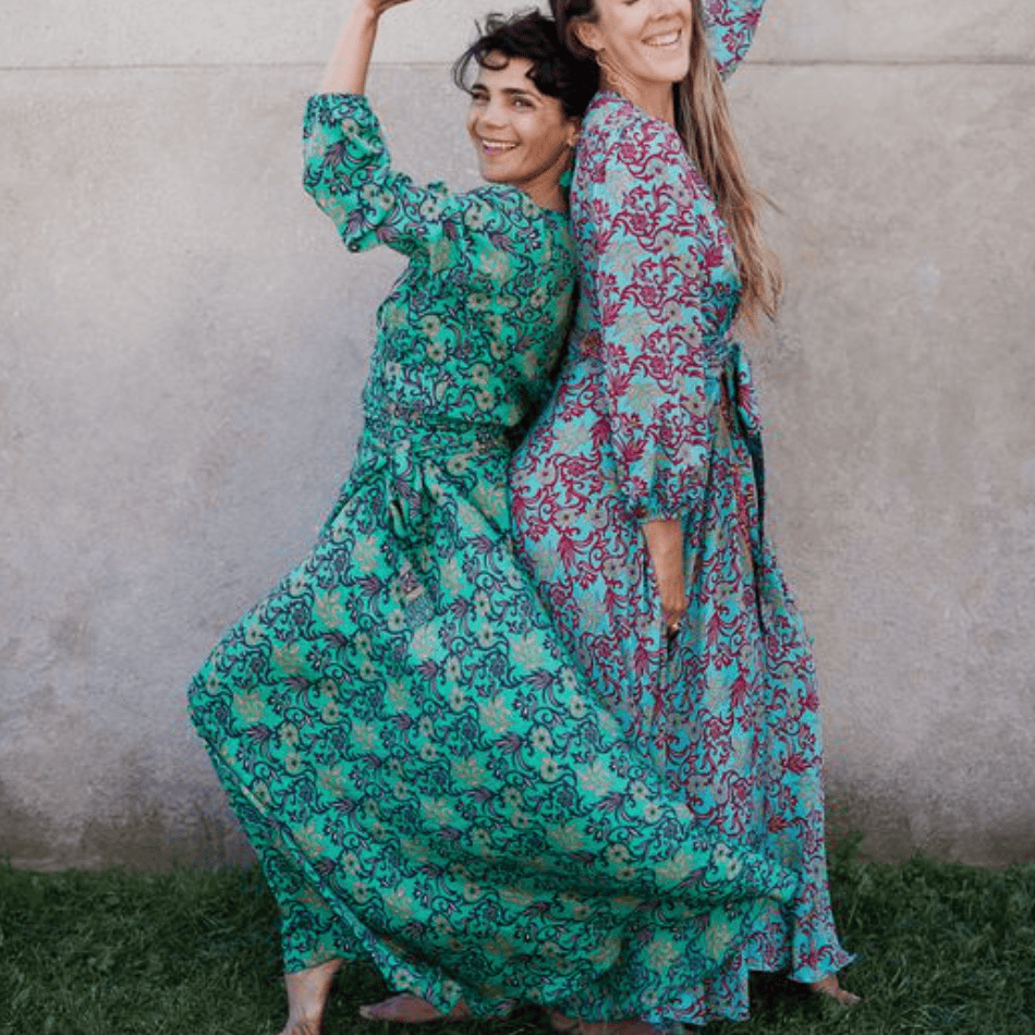 Two women in floral dresses, Screenshot August 16, 2025