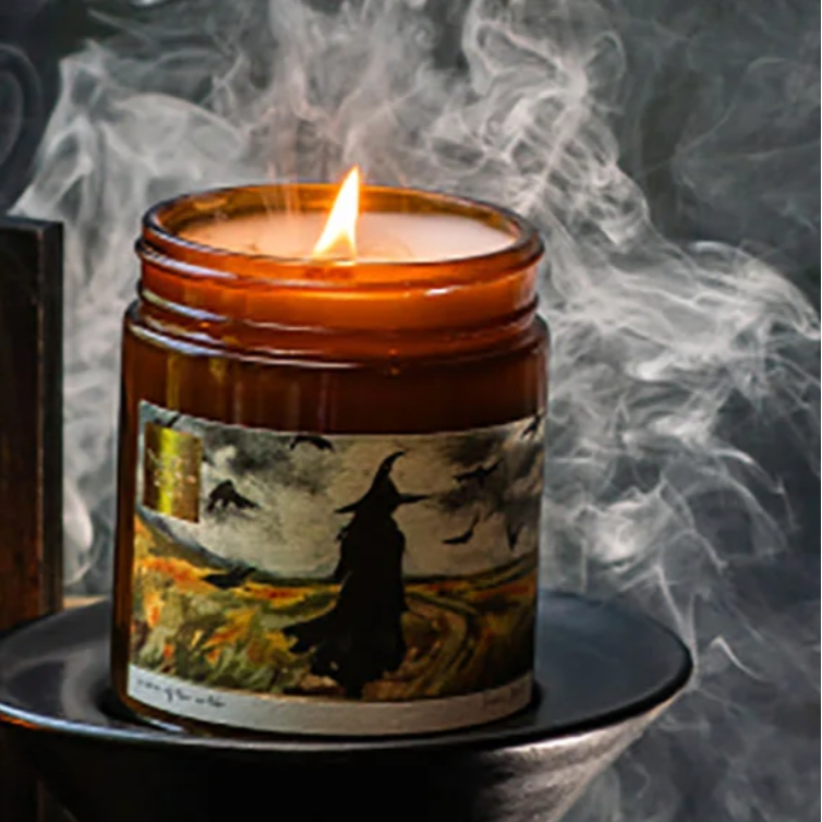 Halloween candle with witch image, screenshot August 27, 2025.