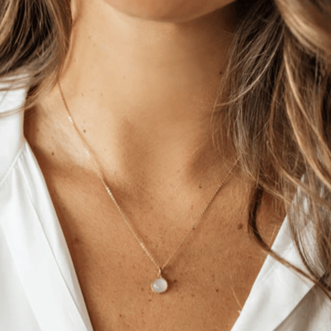 Woman wearing gold necklace, August 27, 2025 screenshot.