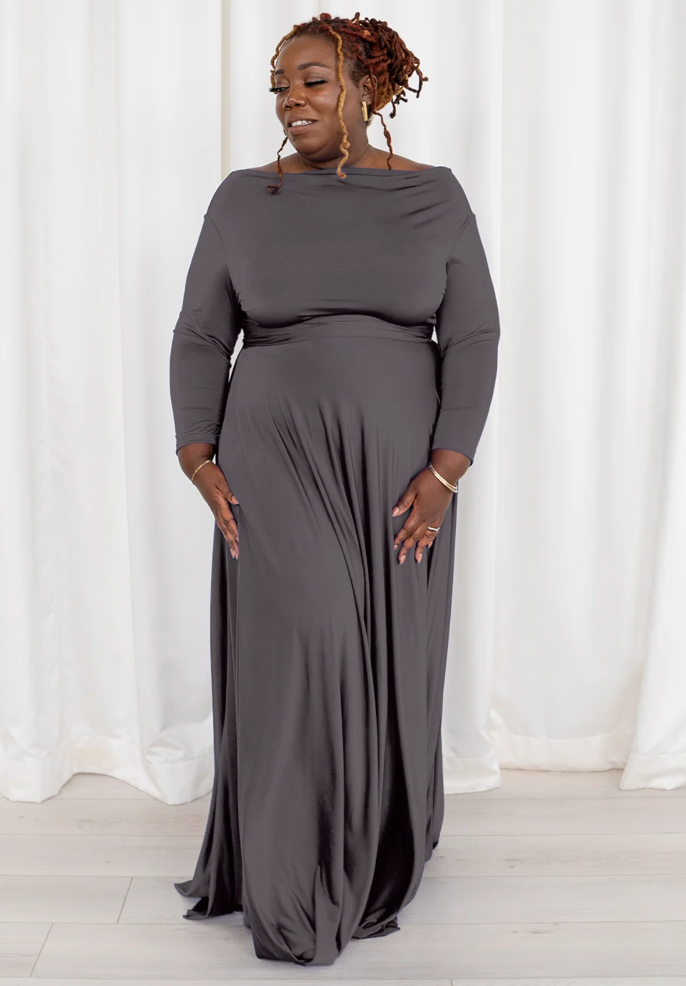 Woman in gray maxi dress, screenshot Sept 4, 2025