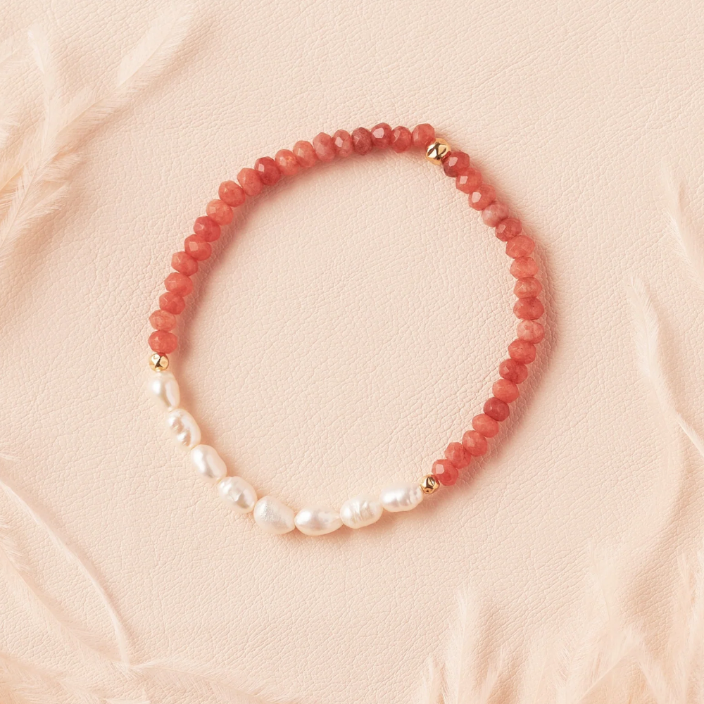 Screenshot of a beaded coral and pearl bracelet.