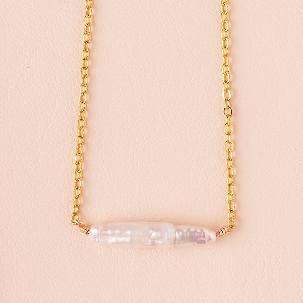Gold necklace with pearl bar, screenshot from Sept 4, 2025.