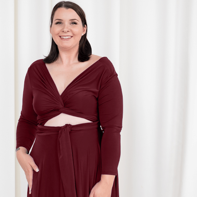 Woman in burgundy dress, Screenshot Sept 6, 2025
