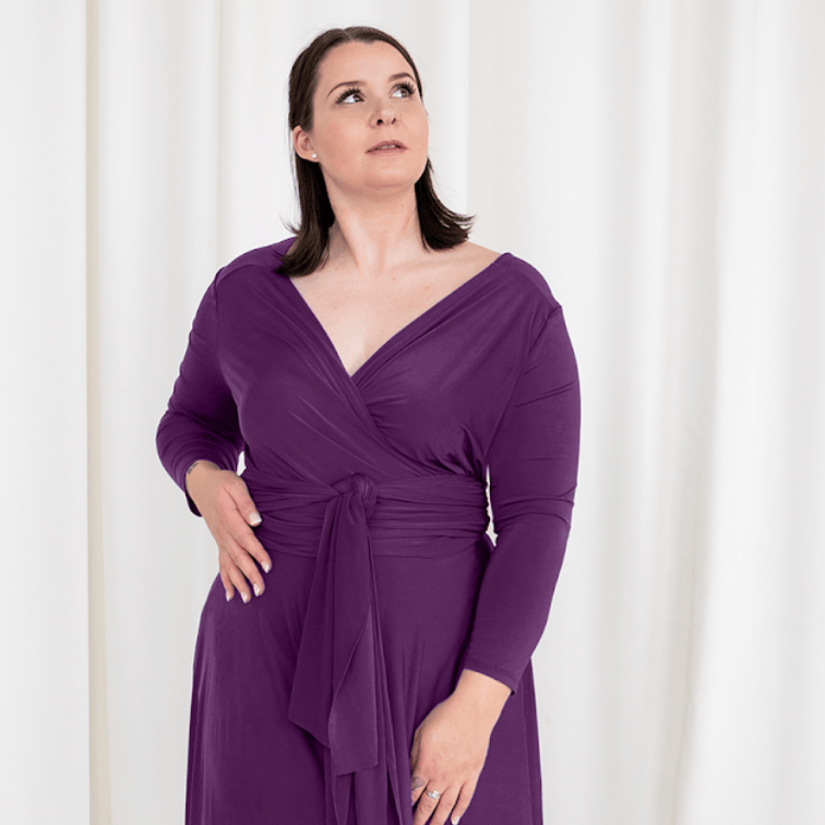 Woman in purple dress, screenshot Sept 6, 2025