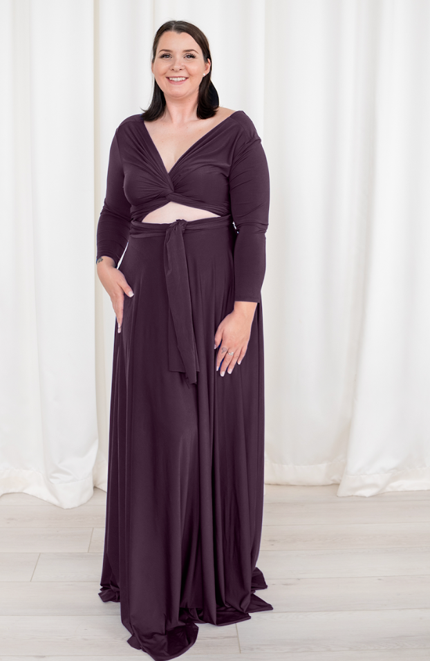 Woman in plum-colored maxi dress, screenshot from Sep 6, 2025.