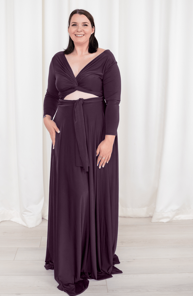 Woman in plum-colored maxi dress, screenshot from Sep 6, 2025.