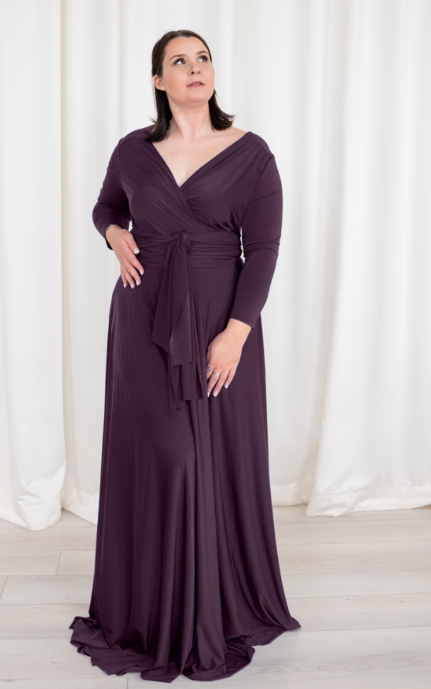 Woman in long purple dress, screenshot Sept 6, 2025