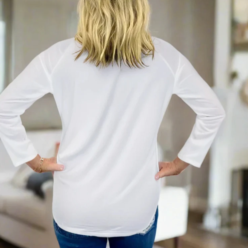 White long-sleeved top screenshot from Sept 9, 2025