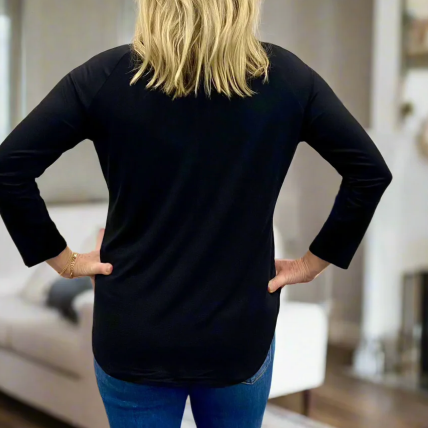 Woman in black long-sleeve shirt, screenshot from September 9, 2025.