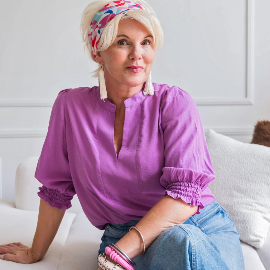 Woman in purple shirt on Sept 9, 2025 screenshot.