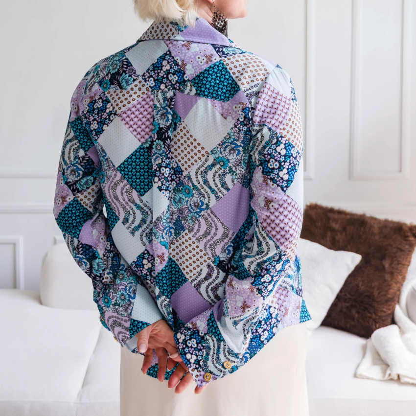 Woman in patchwork jacket, Sept 9, 2025 screenshot