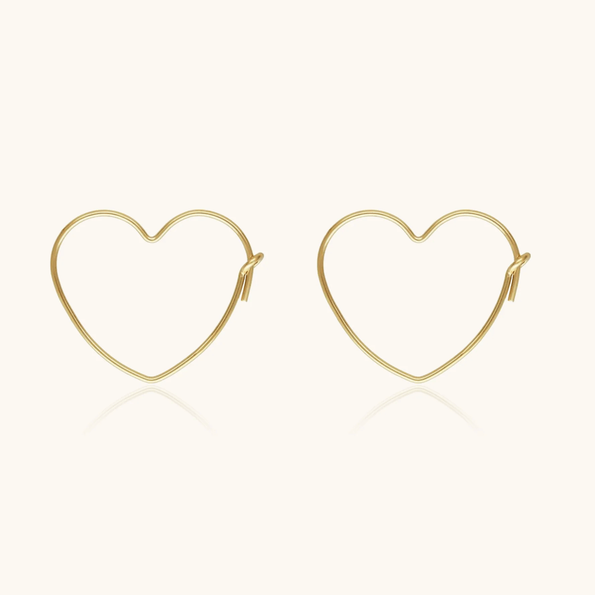 Screenshot of gold heart hoop earrings, Sept 15, 2025