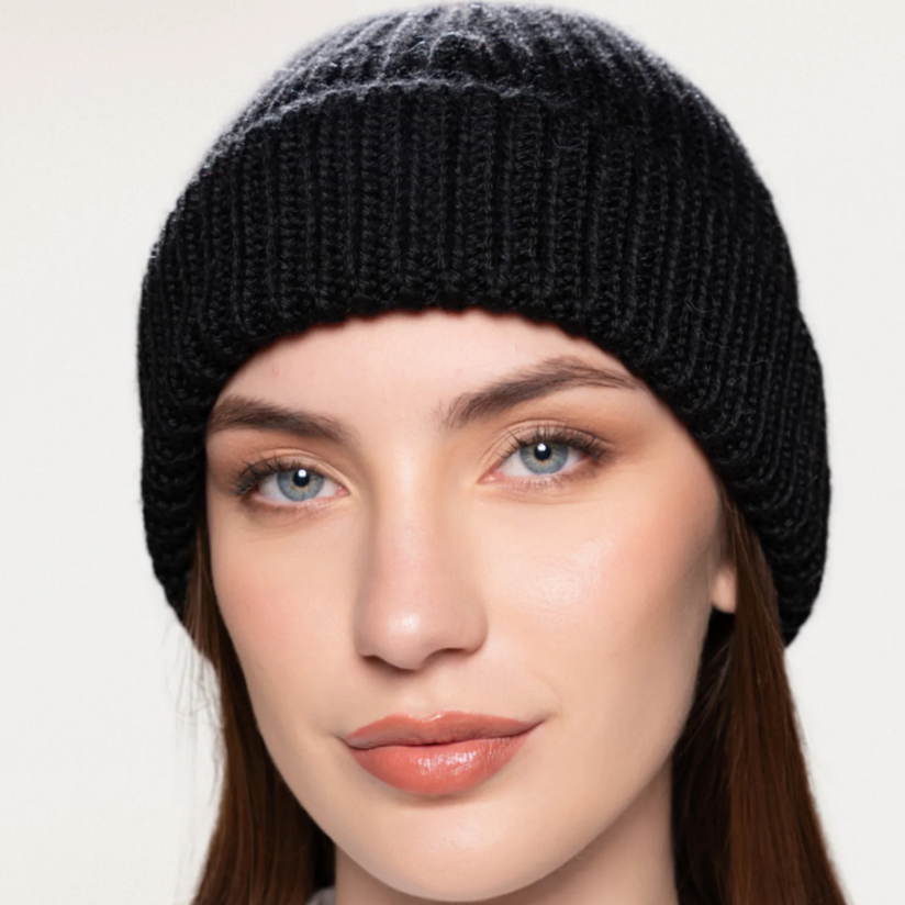 Woman wearing black beanie - Screenshot 2025-09-15
