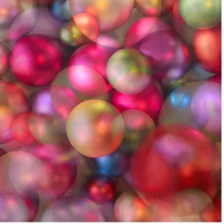 Screenshot of colorful, iridescent orbs, Sept 17, 2025