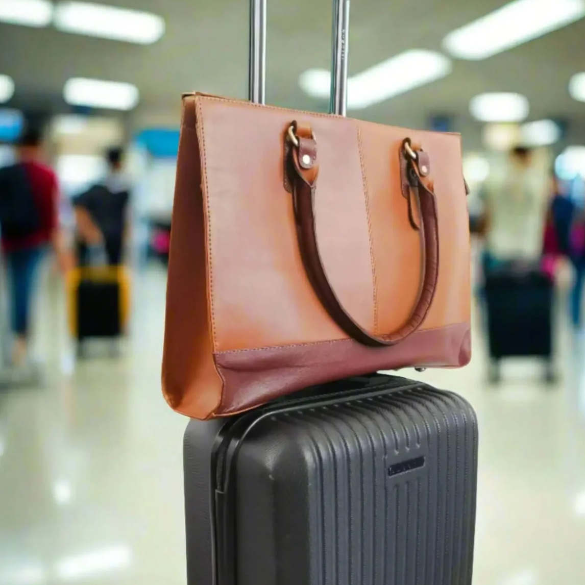 Screenshot of luggage with leather bag at airport, Sept 18, 2025