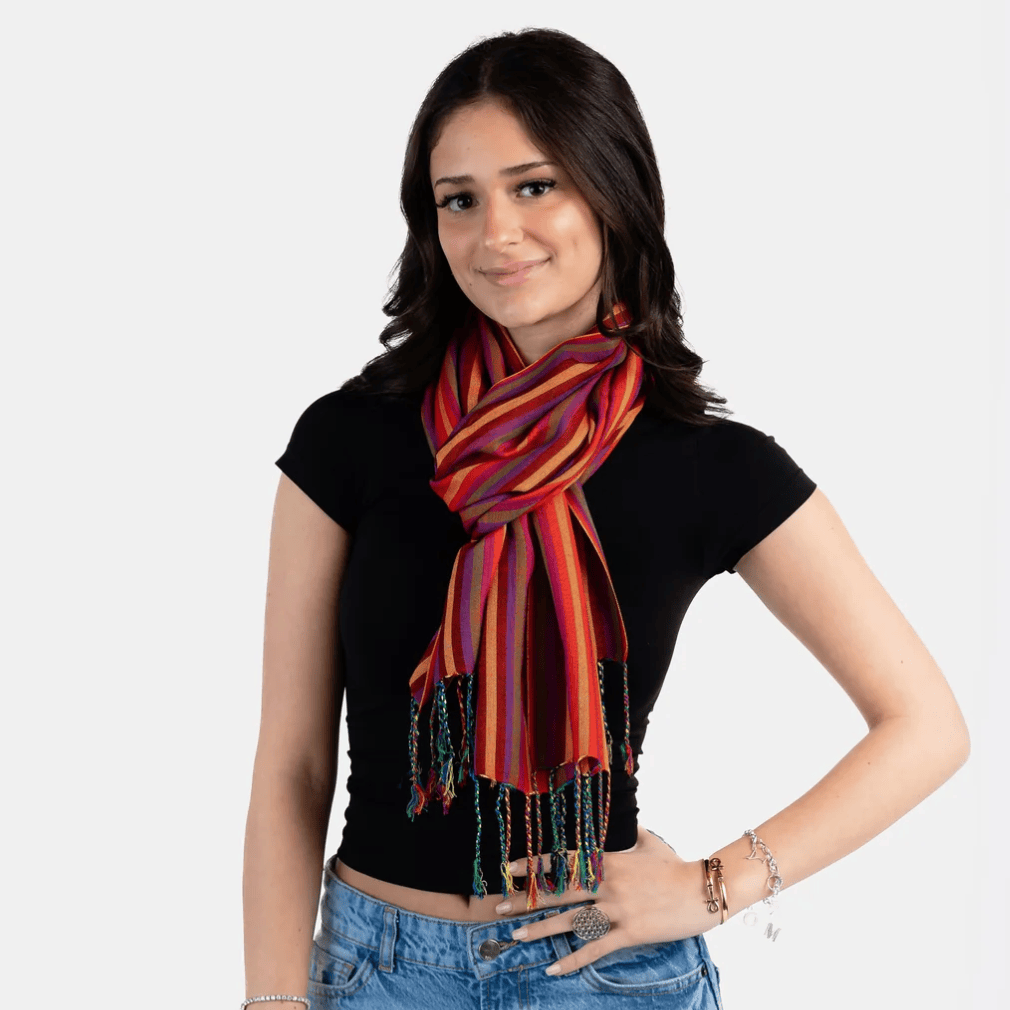 Woman wearing colorful striped scarf