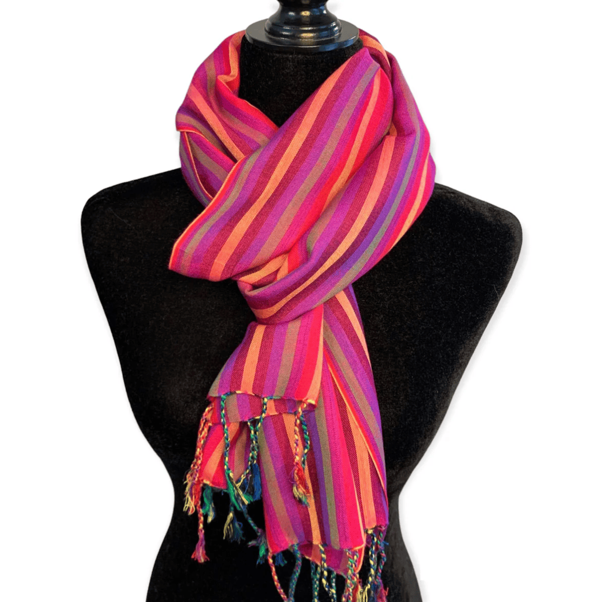 Striped scarf on mannequin, screenshot June 30, 2025.