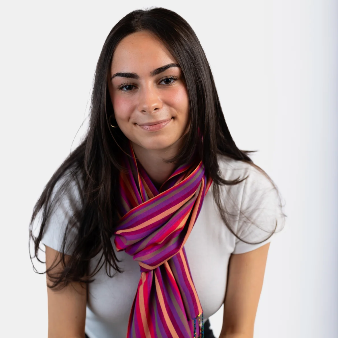 Woman wearing striped scarf, screenshot June 30, 2025