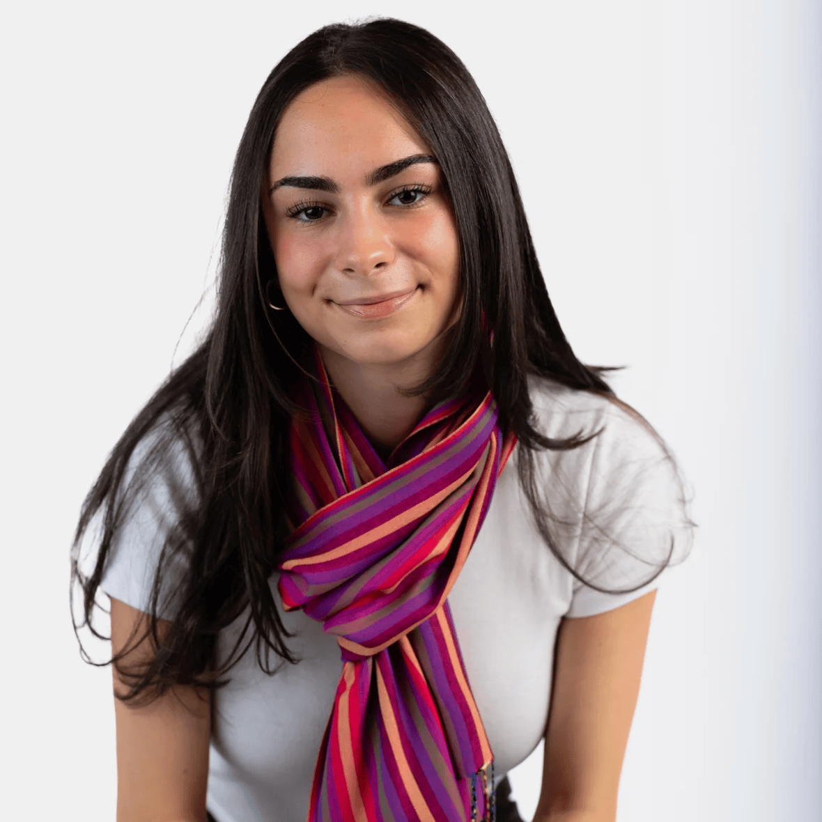 Woman wearing striped scarf, screenshot June 30, 2025