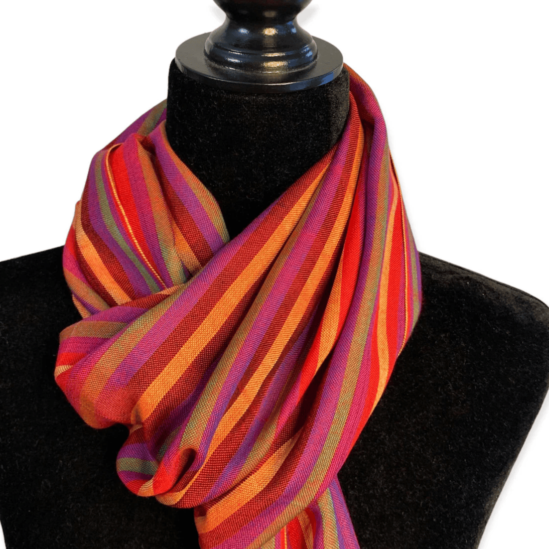 Screenshot of a colorful striped scarf on a mannequin.