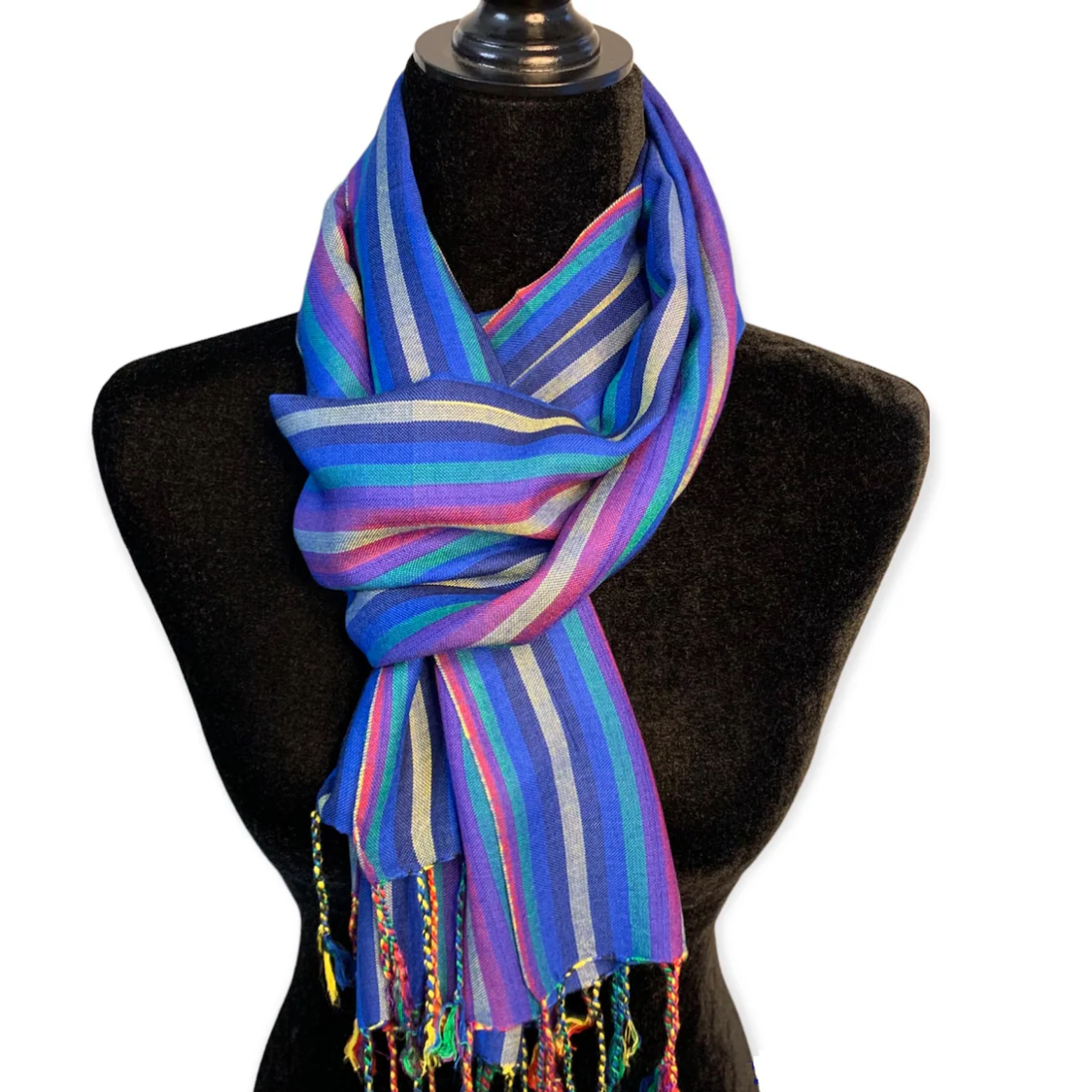 Blue striped scarf on a mannequin, seen June 30, 2025.