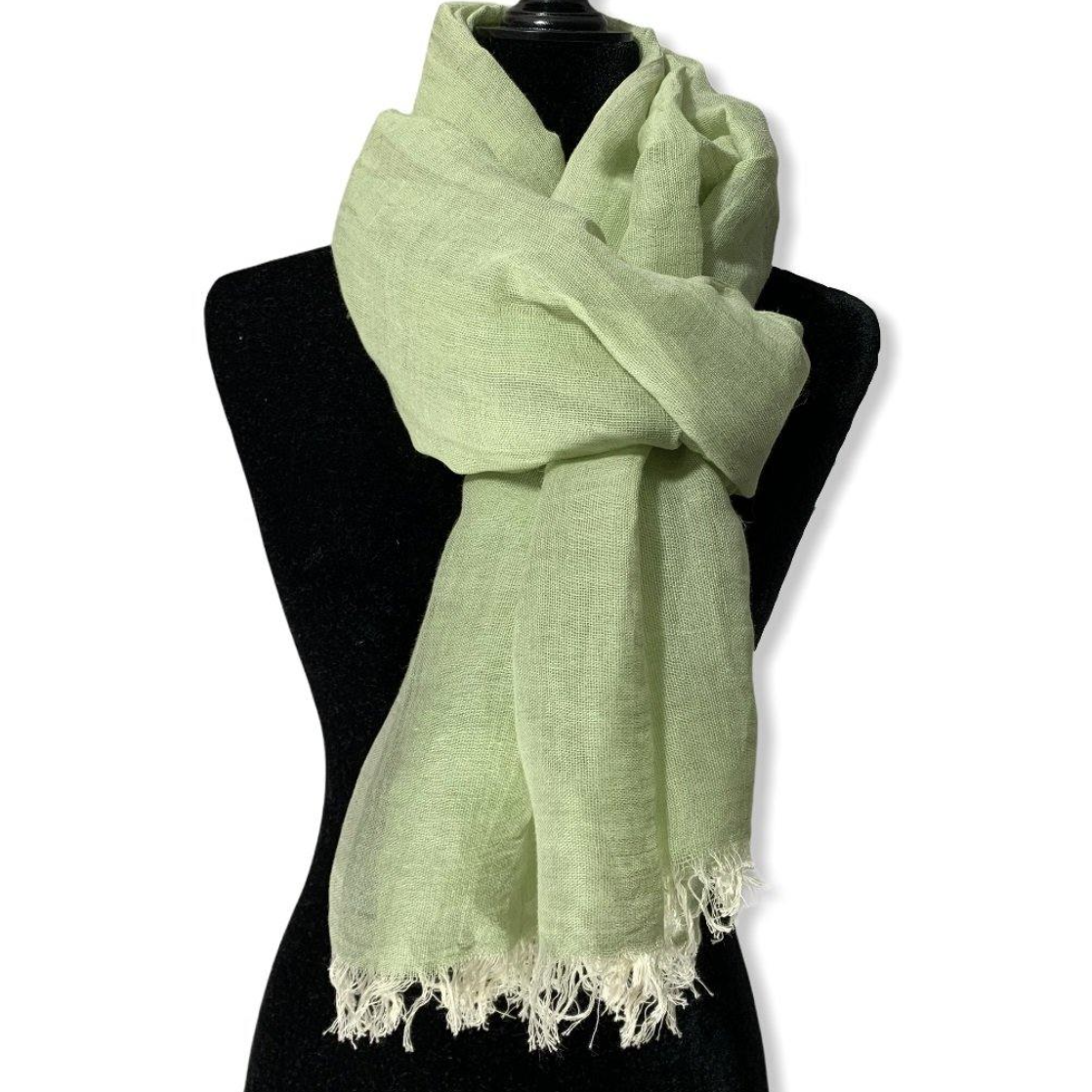 Green scarf on a mannequin, June 30, 2025 screenshot.