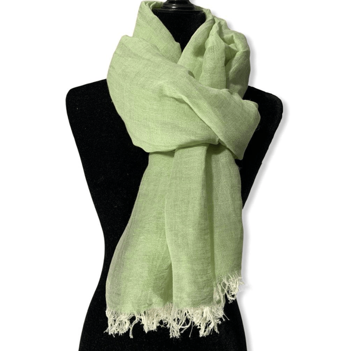 Green scarf on a mannequin, June 30, 2025 screenshot.