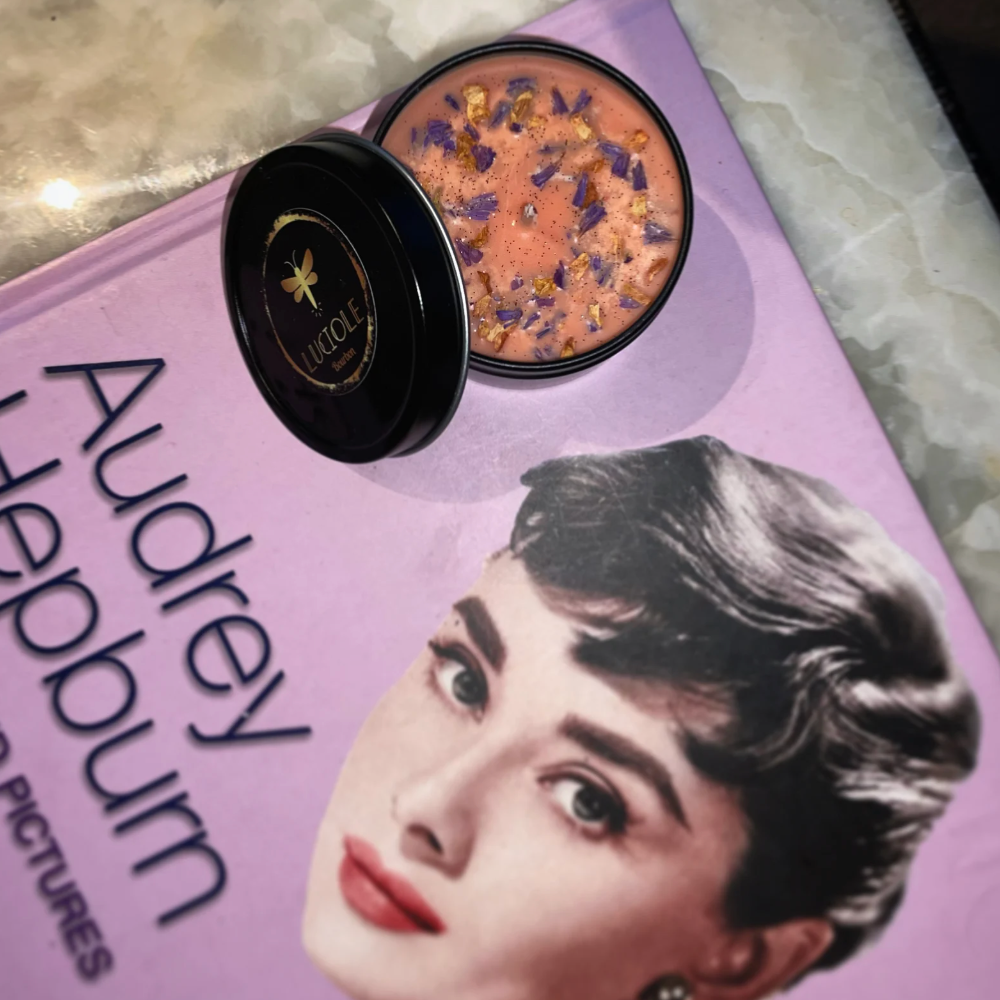 Luciole lip balm on Audrey Hepburn book, screenshot July 22, 2025.