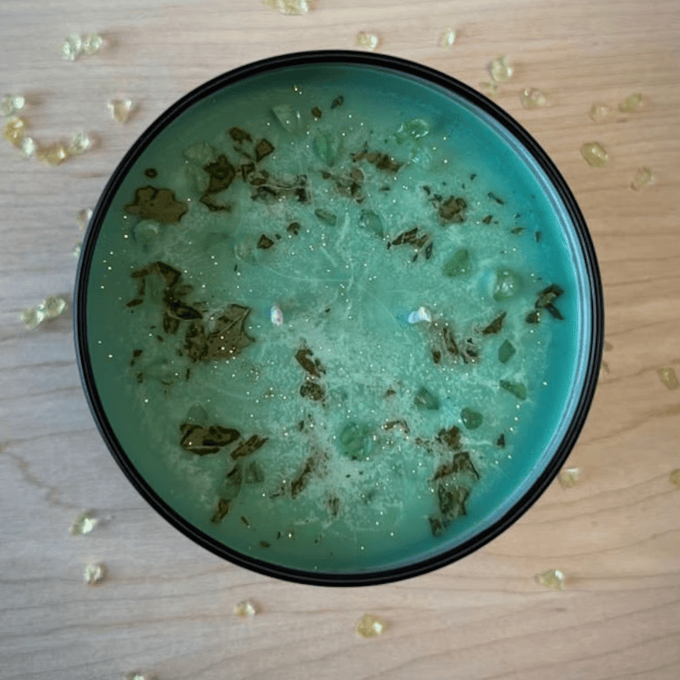 Green candle with crystals, screenshot from July 22, 2025.