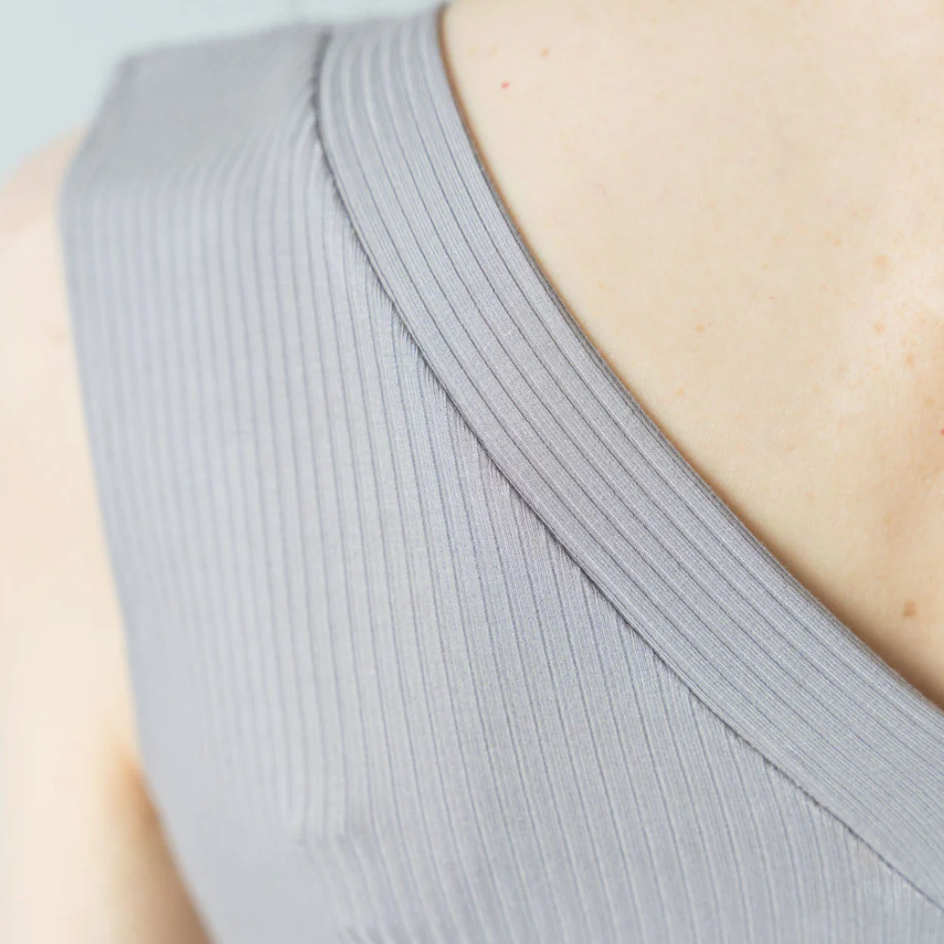 Grey ribbed tank top detail, screenshot July 25, 2025.
