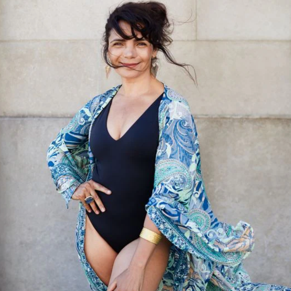 Woman in swimsuit and cover-up, Aug 16 screenshot